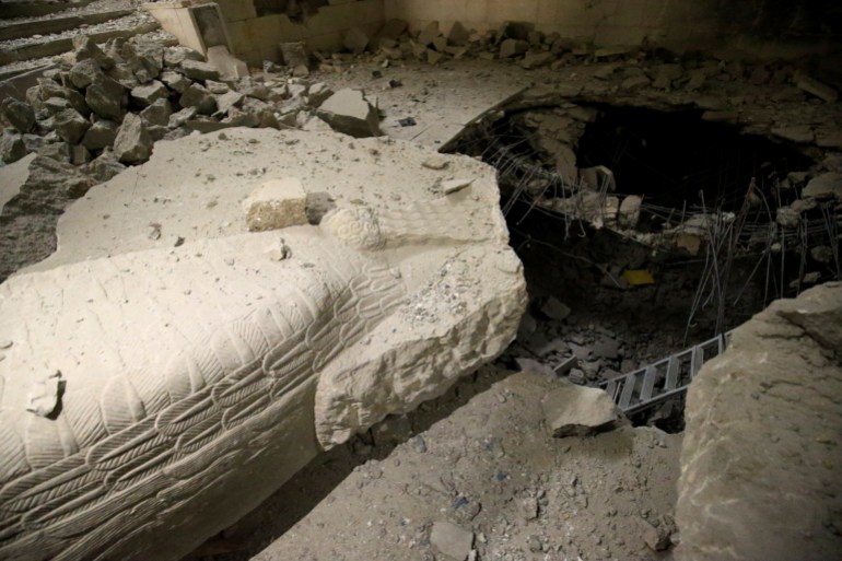 A destroyed artifact is seen at a museum, where Islamic State militants filmed themselves destroying priceless statues and sculptures in 2015, during a battle against the militants in Mosul