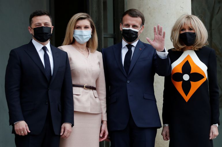 French President Emmanuel Macron and his wife Brigitte Macron welcome Ukraine's President Volodymyr Zelenskiy and his wife Olena for a working lunch at the Elysee Palace in Paris, France, April 16, 2021. REUTERS/Benoit Tessier