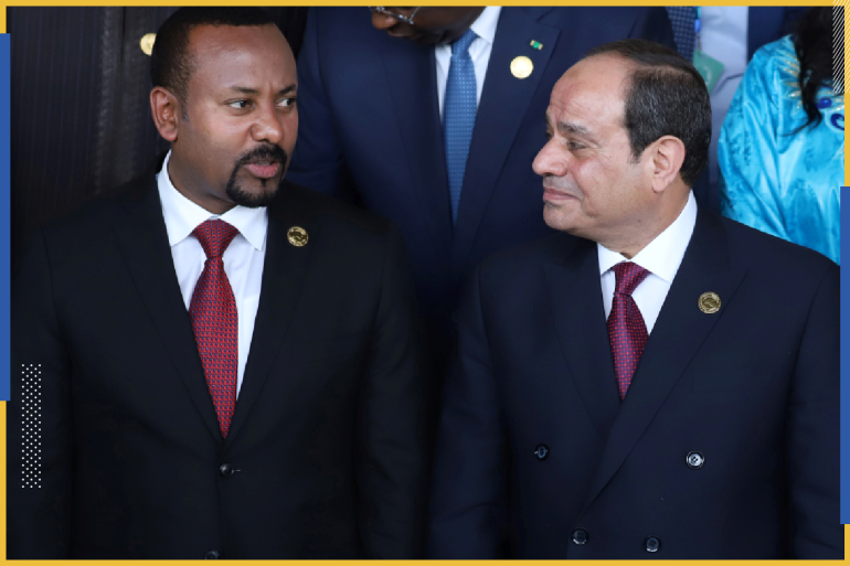 Egyptian President Abdel Fattah el-Sisi talks with Ethiopian Prime Minister Abiy Ahmed at the opening of the 33rd Ordinary Session of the Assembly of the Heads of State and the Government of the African Union (AU) in Addis Ababa, Ethiopia, February 9, 2020. REUTERS/Tiksa Negeri
