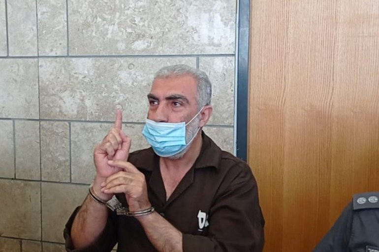 الشيخ كمال خطيب خلال تمديد اعتقال للمرة الرابعة بمحكمة الناصرة، حيث قدمت ضده لائحة اتهام بدعم "الإرهاب"