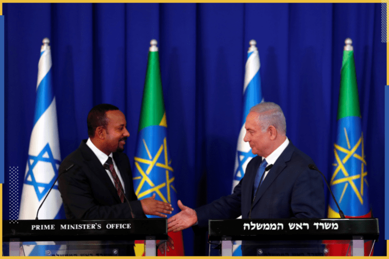 Israeli Prime Minister Benjamin Netanyahu prepares to shake hands with his Ethiopian counterpart Abiy Ahmed during their meeting in Jerusalem September 1, 2019. REUTERS/Ronen Zvulun