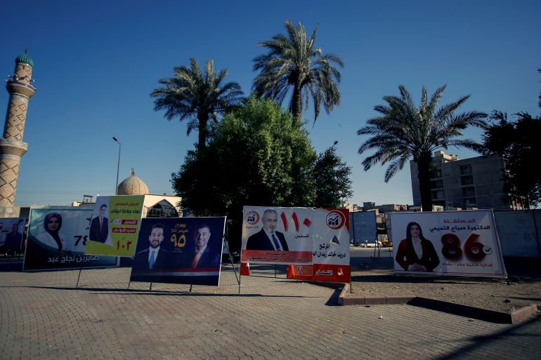 Election campaign posters are pictured ahead of the parliamentary election, in Baghdad