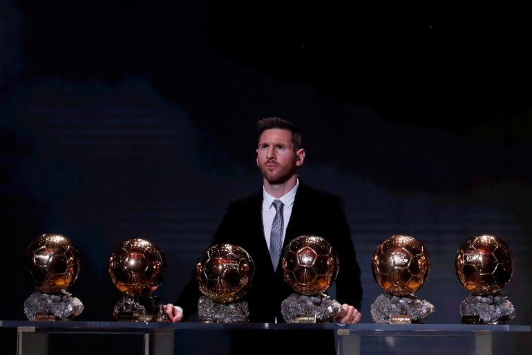The Ballon d’Or awards Soccer Football - The Ballon d’Or awards - Theatre du Chatelet, Paris, France - December 2, 2019 Barcelona's Lionel Messi with his six Ballon d'Or trophies REUTERS/Christian Hartmann TPX IMAGES OF THE DAY