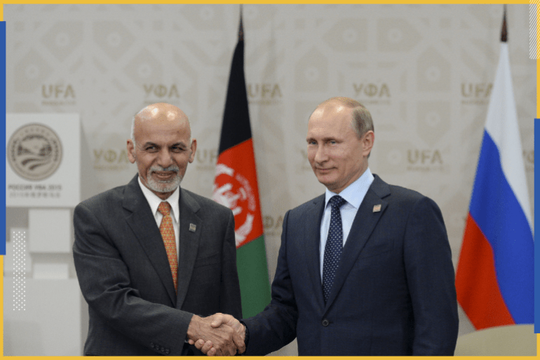 Russia's President Vladimir Putin (R) shakes hands with Afghanistan's President Ashraf Ghani during the Shanghai Cooperation Organization (SCO) summit in Ufa, Russia, July 10, 2015. REUTERS/BRICS/SCO Photohost/RIA Novosti ATTENTION EDITORS - THIS IMAGE HAS BEEN SUPPLIED BY A THIRD PARTY. IT IS DISTRIBUTED, EXACTLY AS RECEIVED BY REUTERS, AS A SERVICE TO CLIENTS.