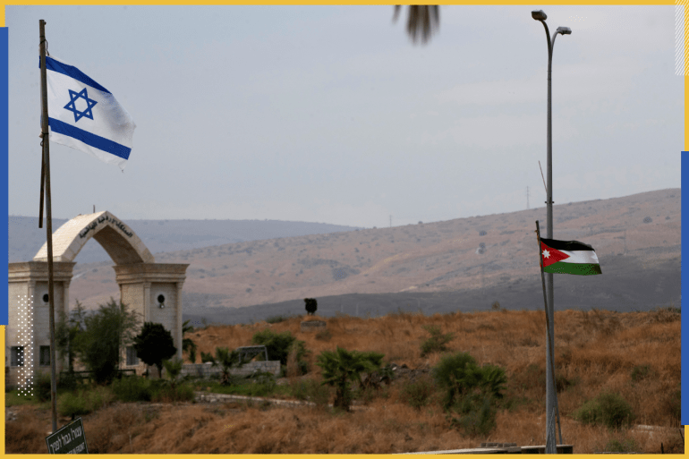 The national flags of Jordan and Israel are seen from the Israeli side of the border area between Israel and Jordan, in Naharayim October 29, 2019. Picture taken October 29, 2019. REUTERS/Ronen Zvulun