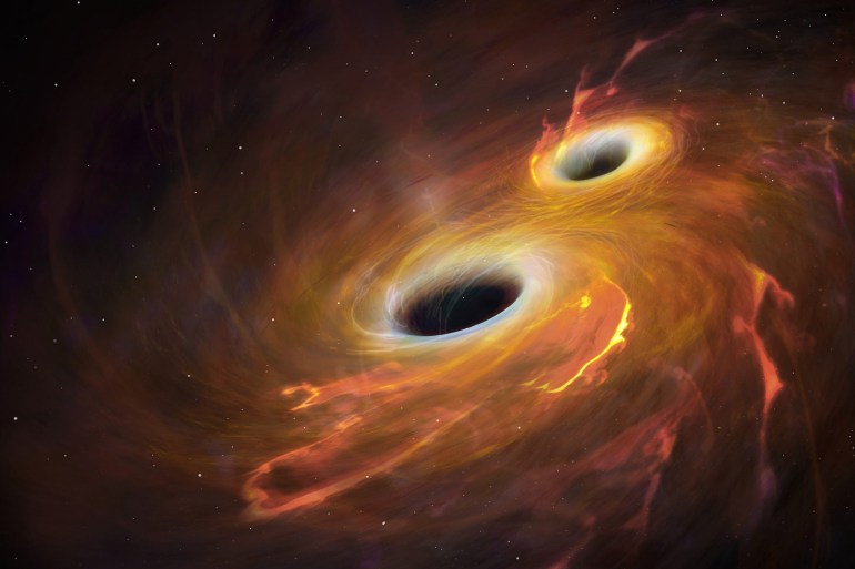 Illustration of two black holes orbiting each other in a combined accretion disc. Eventually the black holes will merge, an event that will produce gravitational waves. Gravity is the distortion of space-time by mass, and changes in this distortion travel in waves at the speed of light. The effect is most pronounced where extremely massive objects are subject to extremely high acceleration. This is seen, for instance, where black holes or neutron stars are in a close orbit such as this. In February 2016, gravitational waves were detected for the first time, 100 years after Einsteins prediction. The waves emanated from the collision of two black holes, of 36 and 29 solar masses, some 1.3 billion light years away. The waves were extremely faint by the time they arrived at Earth, where they were detected by the two LIGO detectors in the USA.