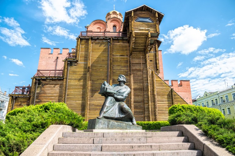 Kyiv, Ukraine - May 14, 2021: Ancient gates and dome of a church over the medieval fortress Golden Gate in Kiev, Ukraine. Medieval architecture of ancient Slavic Kievan Rus; Shutterstock ID 1976259227; purchase_order: ajnet; job: ; client: ; other: