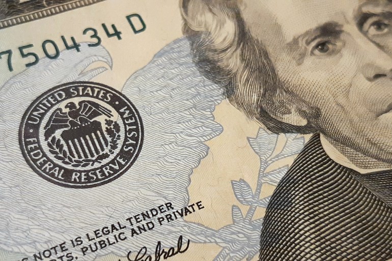federal reserve system sign on twenty dollars banknote closeup