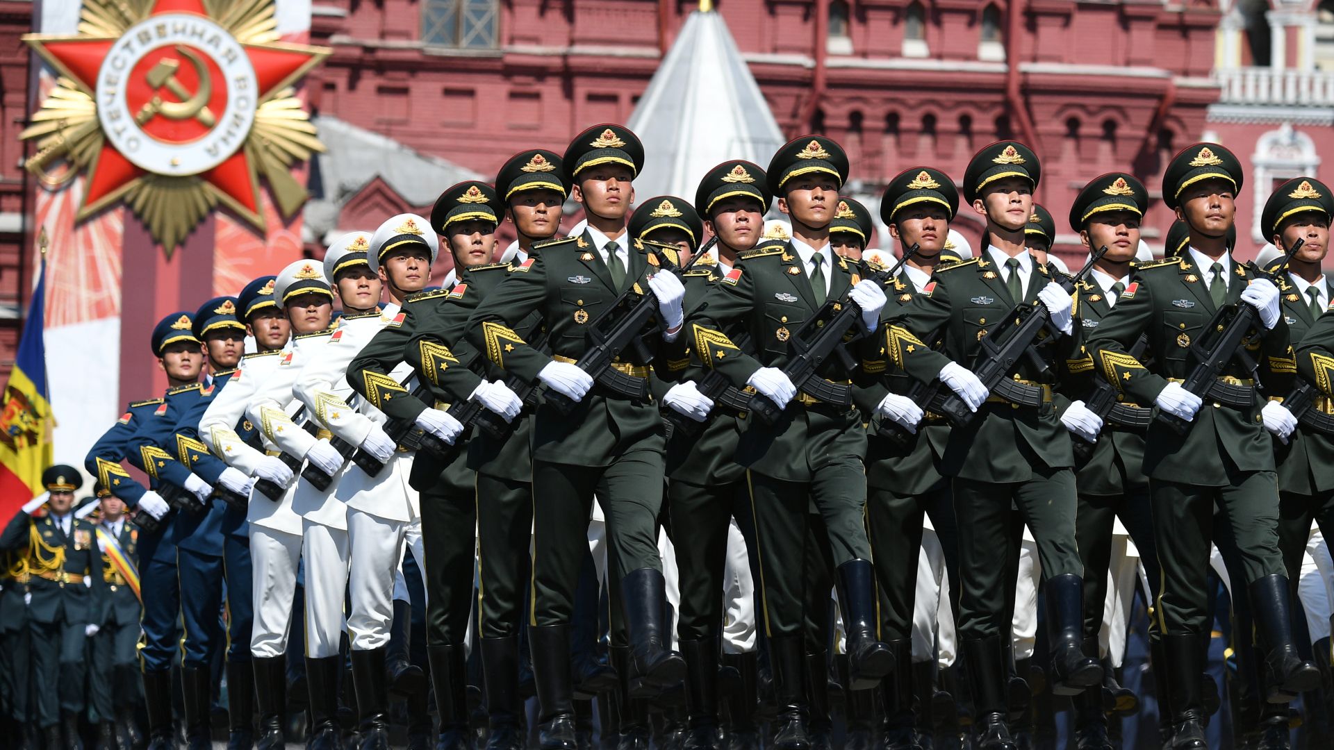 Soldiers of China's People's Liberation Army march during the Victory Day Parade in Red Square in Moscow, Russia, June 24, 2020. The military parade, marking the 75th anniversary of the victory over Nazi Germany in World War Two, was scheduled for May 9 but postponed due to the outbreak of the coronavirus disease (COVID-19). Host photo agency/Ramil Sitdikov via REUTERS