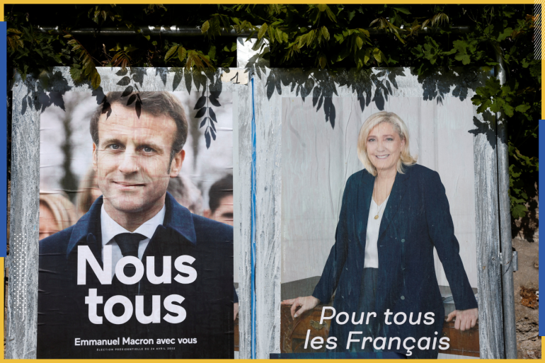 Official campaign posters of 2022 French presidential election candidates Marine le Pen, French far-right National Rally (Rassemblement National) party candidate, and French President Emmanuel Macron, candidate for his re-election are displayed on an official billboard in Herbeville, France, April 21, 2022. REUTERS/Benoit Tessier