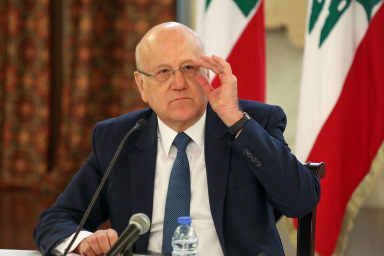 Lebanese Prime Minister Najib Mikati attends a news conference on the latest developments in the country, at the governmental palace in Beirut