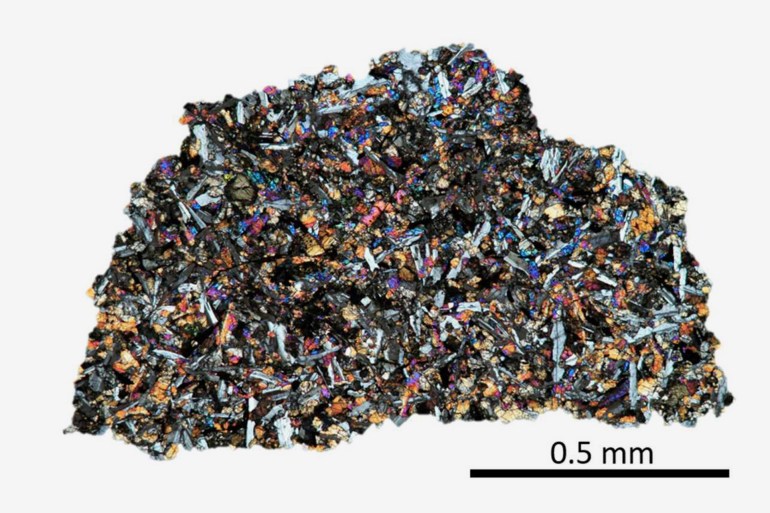 Thin section of NASA sample, LAP 02436, Lunar Mare Basalt containing indigenous noble gases. Image type: optical microscopy, cross- polarized light. (Image: ETH Zurich / Patrizia Will)