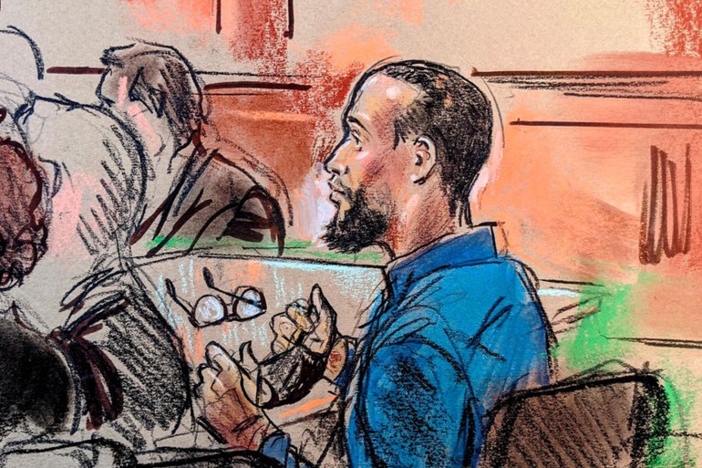 El Shafee Elsheikh, a former British national accused of engaging in lethal hostage-taking and conspiracy to commit murder as an alleged member of an Islamic State cell nicknamed "the Beatles" that operated in Syria and Iraq, takes off his face mask and glasses for identification purposes as he attends testimony in his trial in U.S. federal court in Alexandria, Virginia, U.S. April 1, 2022. REUTERS/Bill Hennessy
