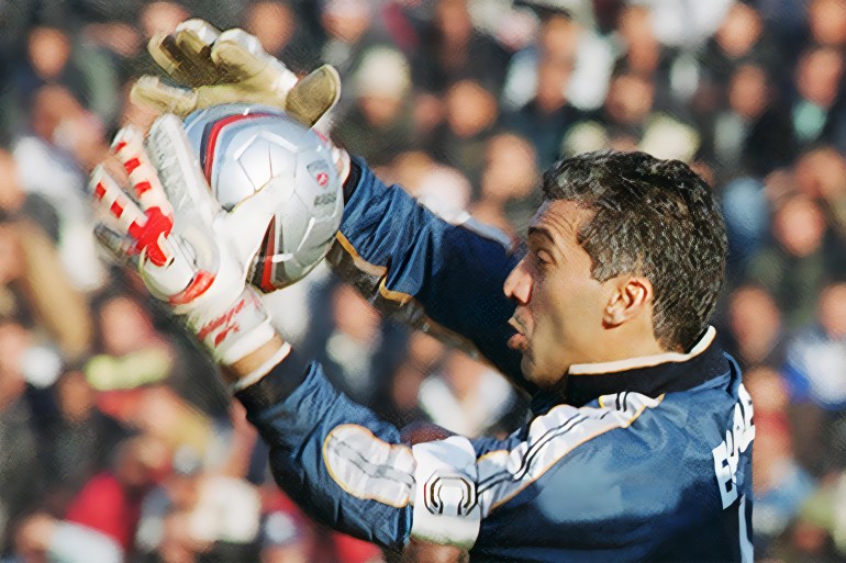 Recent picture of Tunisian national soccer team captain and goalkeeper Chokri El Ouaer jumping to grab the ball during a soccer match. Tunisia is one of the 32 teams that will participate in the 2002 FIFA World Cup taking place in South Korea and Japan from 31 May to 30 June. AFP PHOTO/FETHI BELAID (Photo by Fethi Belaid / AFP) (Photo by FETHI BELAID/AFP via Getty Images)