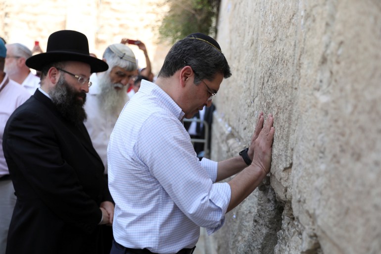 Honduras' President Juan Orlando Hernandez is seen at the Western Wall hours before the opening of a Honduran Trade Office, which will be an extension of Honduras' embassy in Tel Aviv, in Jerusalem Old City