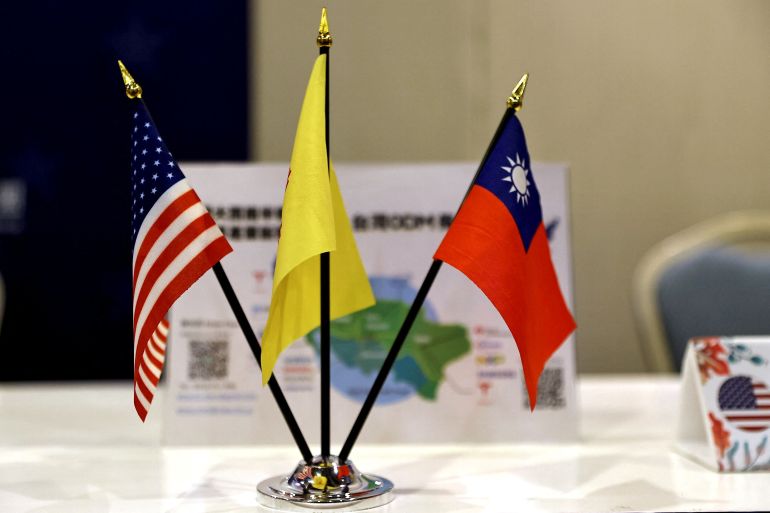Flags of U.S., New Mexico and Taiwan are placed during the U.S. Business day event in Taipei