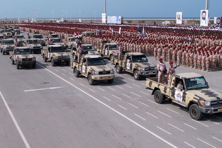 Members of Houthi military forces parade in the Red Sea port city of Hodeida