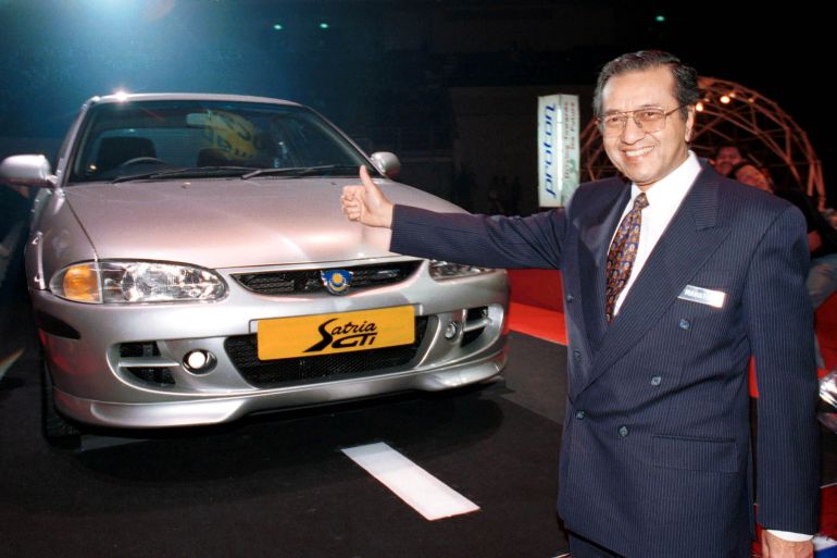 MAHATHIR MOHAMAD ATTENDS THE LAUNCHING OF PROTON SATRIA IN KUALA LUMPUR.