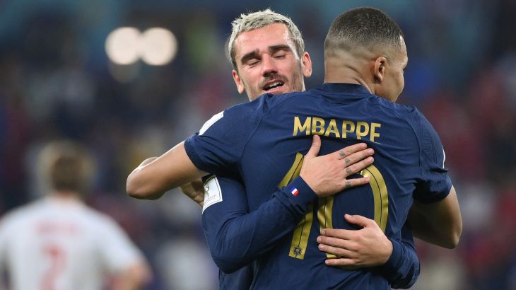 France's forward #10 Kylian Mbappe celebrates with France's forward #07 Antoine Griezmann after scoring his team's first goal during the Qatar 2022 World Cup Group D football match between France and Denmark at Stadium 974 in Doha on November 26, 2022. (Photo by FRANCK FIFE / AFP)