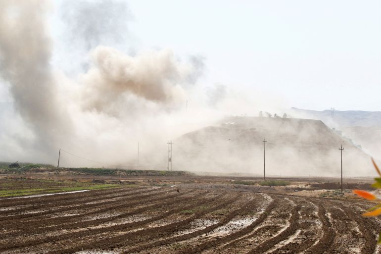 Smoke rises from the Iraqi Kurdistan headquarters of the Kurdistan Freedom Party