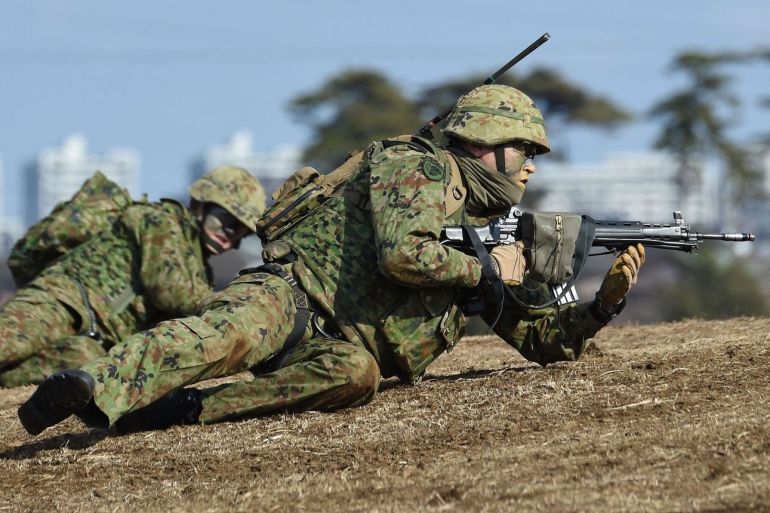 Soldiers from Japan's Ground Self-Defence Force 1st Airborne Brigade participate in an exercise at the Narashino training ground on Jan.13, 2019. PHOTO: KAZUHIRO NOGI/AGENCE FRANCE-PRESSE/GETTY IMAGES