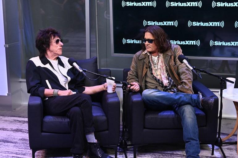 NEW YORK, NEW YORK - OCTOBER 12: (L-R) Jeff Beck and Johnny Depp attend SiriusXM's Town Hall hosted by Steven Van Zandt in support of their new album ‘18’ on October 12, 2022 in New York City. Noam Galai/Getty Images for SiriusXM/AFP