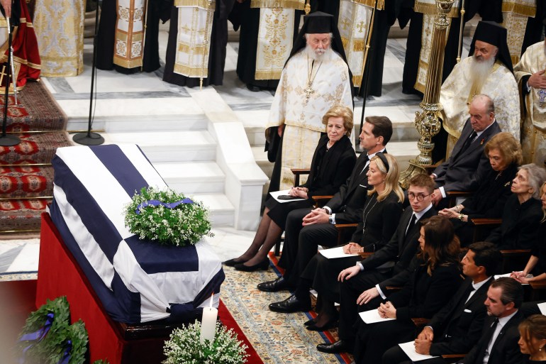 Greece's former Queen Anne Marie, former Crown Prince Pavlos and Princess Marie-Chantal, former Spanish King Juan Carlos and Queen Sofia attend the funeral service of former King of Greece Constantine II in the Metropolitan Cathedral of Athens, Greece, January 16, 2023. REUTERS/Stoyan Nenov/Pool