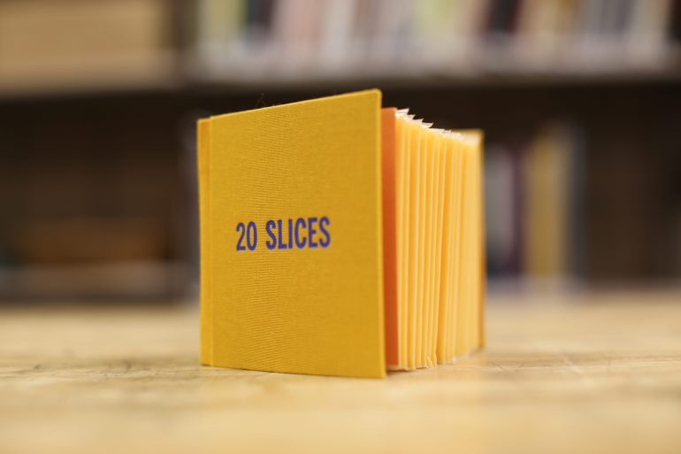 Denzer’s books remind you that books are objects. Also, cheese is fun. EMILY BUCKLER/UNIVERSITY OF MICHIGAN LIBRARY