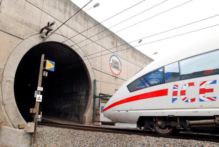 A German ICE high speed train exits the Channel Tunnel that links France to Britain as part of a test, Wednesday Oct. 13, 2010 in Coquelles, northern France. Eurotunnel Chairman will later hold a news conference to discuss planned tests of Siemens-built train that Deutsche Bahn wants to put into service through the under-sea link between Britain and the continent, amid controversy over competitor Eurostar's plans for a $1.1 billion order for similar trains. (AP Photo)