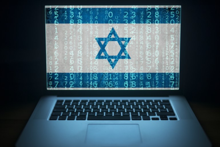 Laptop with binary computer code and an Israel flag on the screen. Internet and network security.