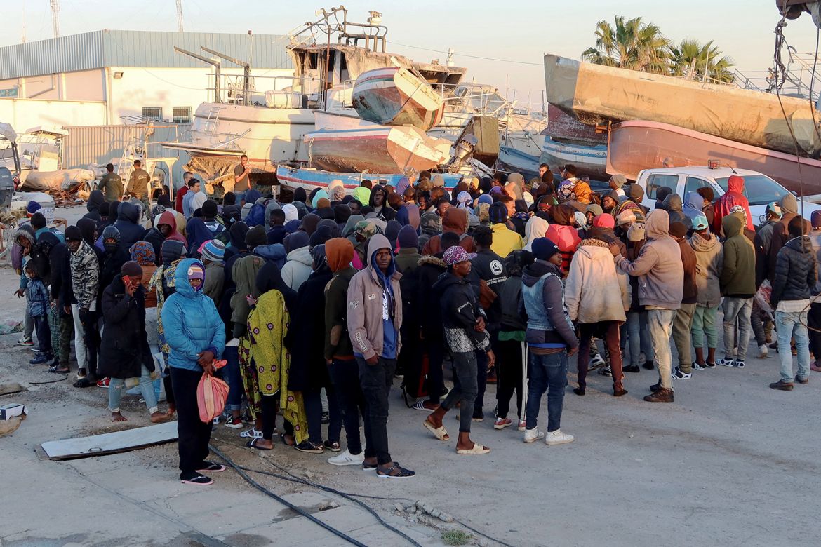 Migrants wait at Sfax port, after being stopped by Tunisian coast guard at sea during their attempt to cross to Italy, Tunisia April 26, 2023. REUTERS/Jihed Abidellaoui