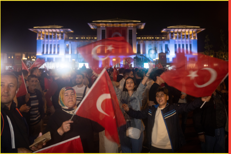 ANKARA, TURKEY - MAY 28: Supporters sing and wave flags as they await an appearance by President Recep Tayyip Erdogan at the presidential palace after he won reelection in a runoff on May 28, 2023 in Ankara, Turkey. Erdogan was forced into a runoff when neither he nor his main challenger, Kemal Kilicdaroglu of the Republican People's Party (CHP), received more than 50 percent of the vote in the May 14 election. (Photo by Chris McGrath/Getty Images)