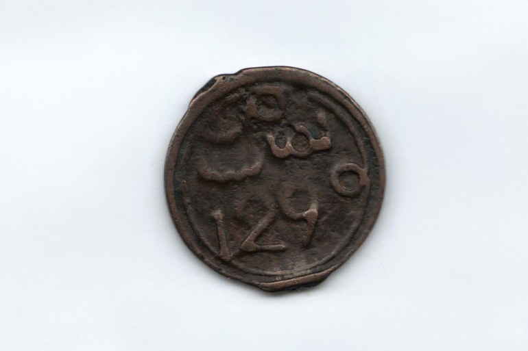 عملة مغربية فيها أرقام عربية صكت سنة 1290 هـ
