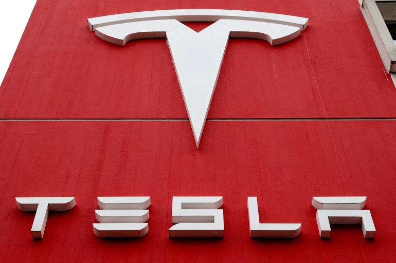 FILE PHOTO: The logo of car manufacturer Tesla is seen in Bern, Switzerland