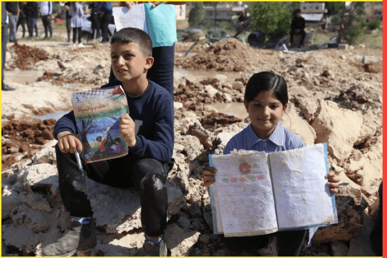 Palestinians gather near the damage of Jibb Al-Deeb School demolished by Israeli authorities in the small Palestinian village of Bayt Ta'mar, Bethlehem, West Bank, Palestinian Territory - 07 May 2023