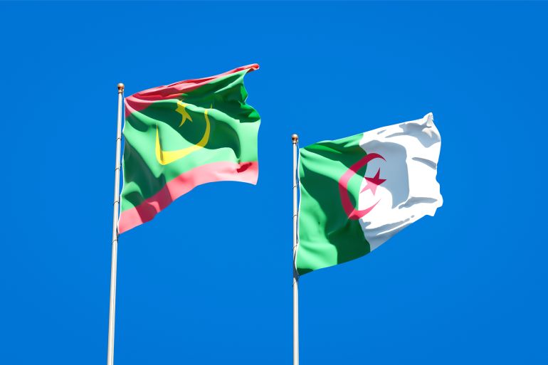 Beautiful national state flags of Mauritania and Algeria together at the sky background. 3D artwork concept.; Shutterstock ID 1873303819; purchase_order: AJA; job: ; client: ; other: