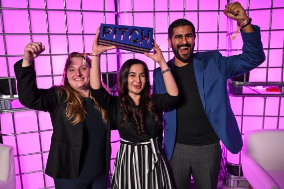 Doha , Qatar - 29 February 2024; Joanna Kurylo, Breshna.io, left, with PITCH winner Mariam Nusrat, Founder & CEO, Breshna.io (No Code Video Games), centre, and Aly Madhavji, Managing, Partner, Blockchain Founders Fund, celebrate with the PITCH trophy backstage on Centre stage during day three of Web Summit Qatar 2024 at the Doha Exhibition and Convention Center in Doha, Qatar. (Photo By Stephen McCarthy/Sportsfile for Web Summit Qatar via Getty Images)