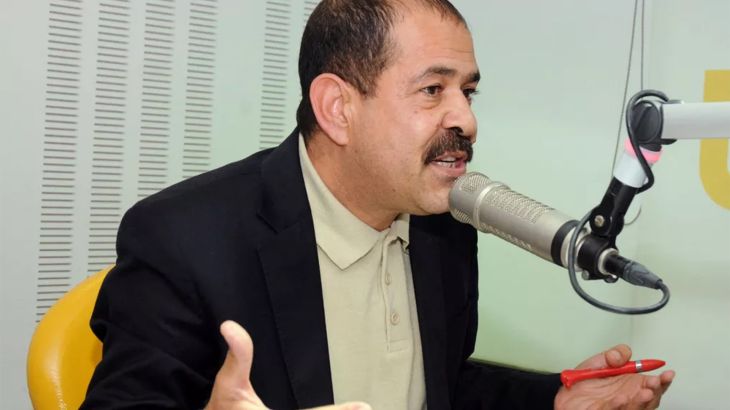 A picture taken on November 20, 2012 shows Tunisian lawyer and opposition leader Chokri Belaid speaking during a radio interview in Tunis. Chokri Belaid, who was gunned down outside his home on February 6, was a fierce opponent of Tunisia's ruling Islamists and a pan-Arab, left-wing activist propelled to the front of the political scene after the revolution. AFP PHOTO / KHALIL (Photo credit should read KHALIL/AFP via Getty Images)