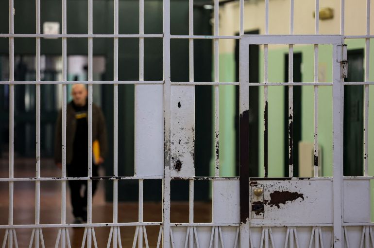 A barred door of a corridor is seen inside San Vittore prison in Milan, Italy, March 4, 2024. REUTERS/Claudia Greco