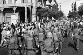 Suez Crisis 1956 - United Nations troops march into Port Said past a restless Egyptian crowd . 25th November 1956. (Photo by Manchester Mirror/Daily Mirror/Mirrorpix via Getty Images) (Getty)